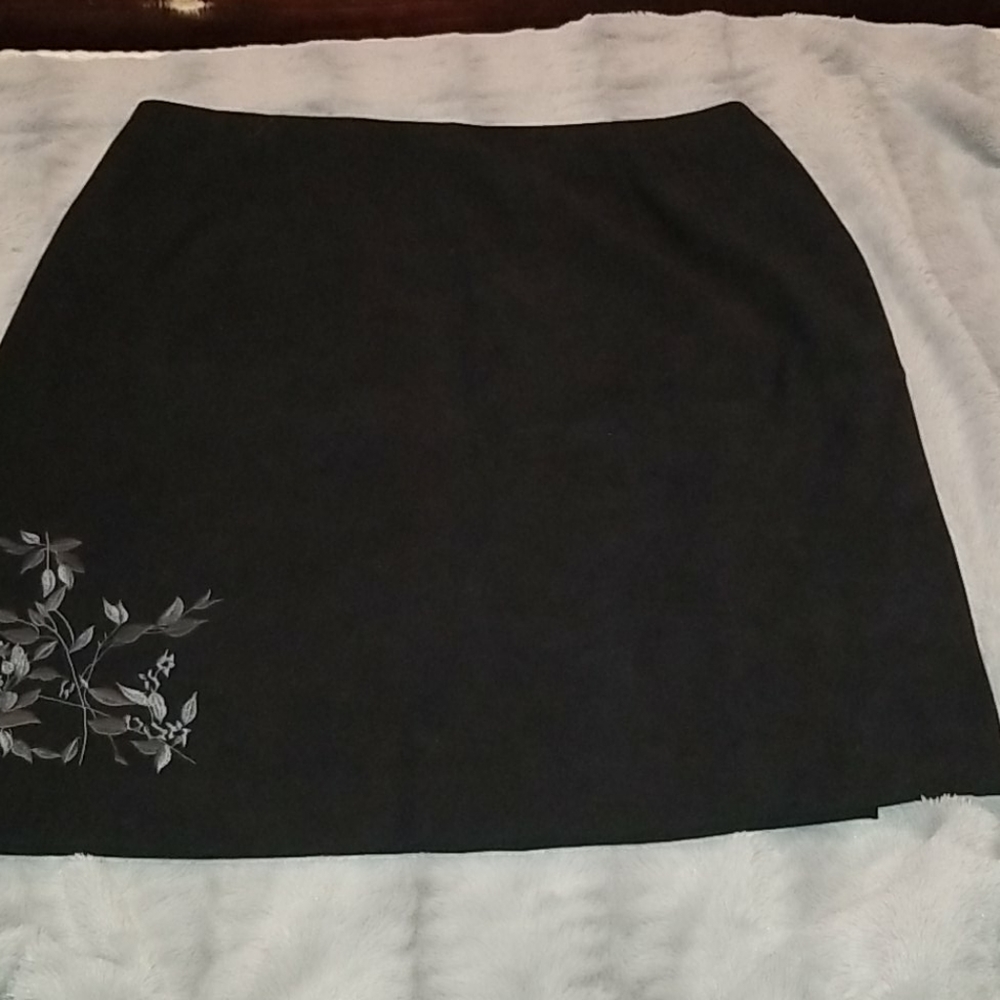EUC black, mid thigh skirt